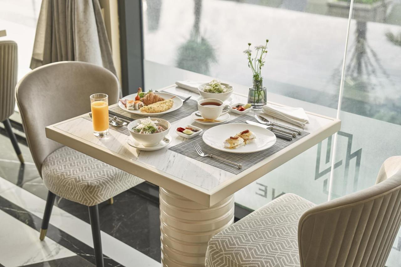 La Siesta Premium Saigon Hotel Хошимин Екстериор снимка A table set for breakfast